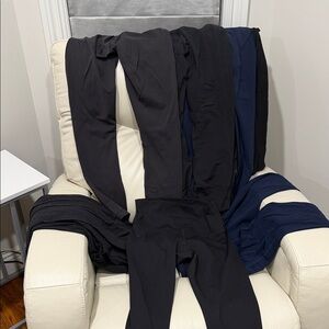 6 pairs of lululemon athletica Black and Navy Leggings.. must want all 6